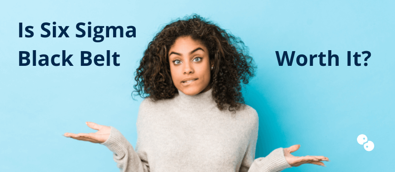 Is Six Sigma Black Belt Worth It? A woman stands in front of a blue background. She is shrugging and biting her lip in indecision